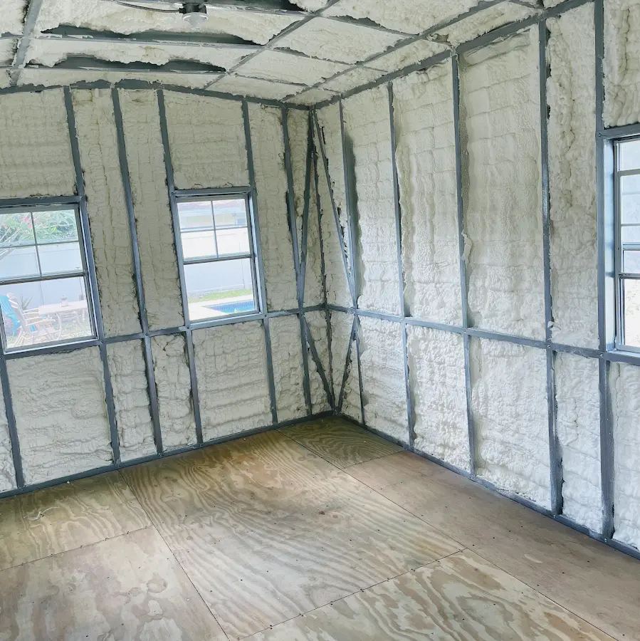 Closed-cell spray foam insulation applied to wall cavities in a residential project in St. Peter
